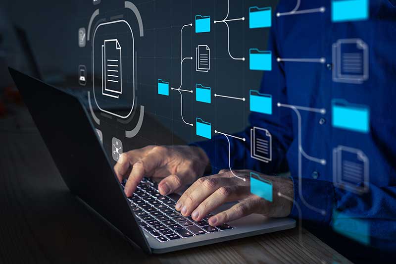 User on computer managing files